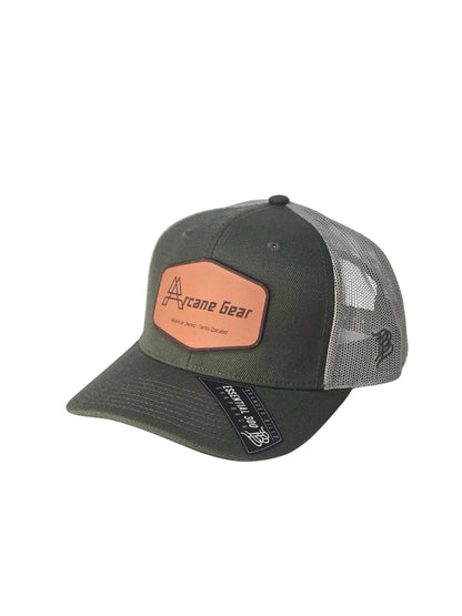 Green cap with a leather patch on a white background